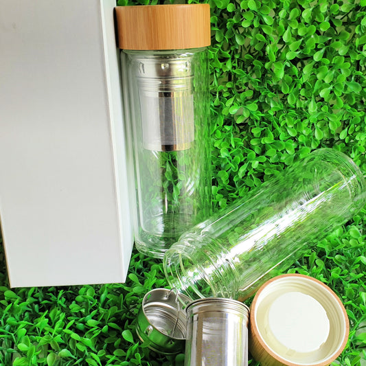 Glass tea bottle with stainless steel infuser and bamboo lid
